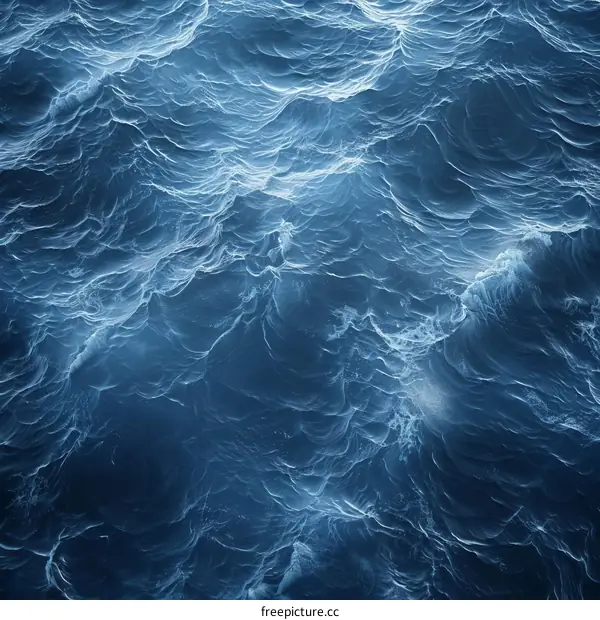 Deep Blue Ocean Surface with Frothy White Waves