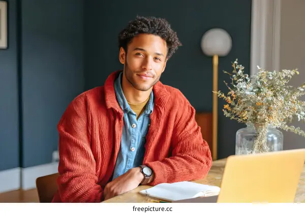 Young Man Working at Home