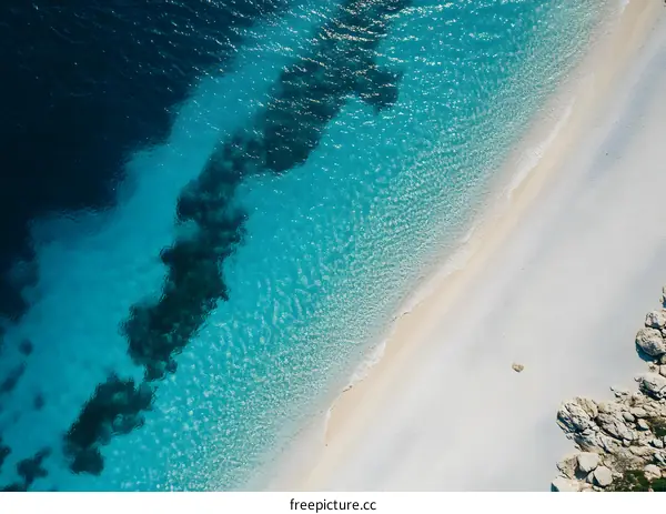 Aerial View of Beach and Ocean with Turquoise Water