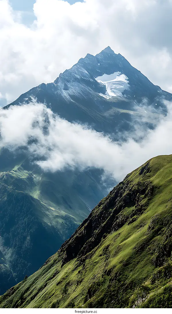 Mountain Range with Clouds and Snow