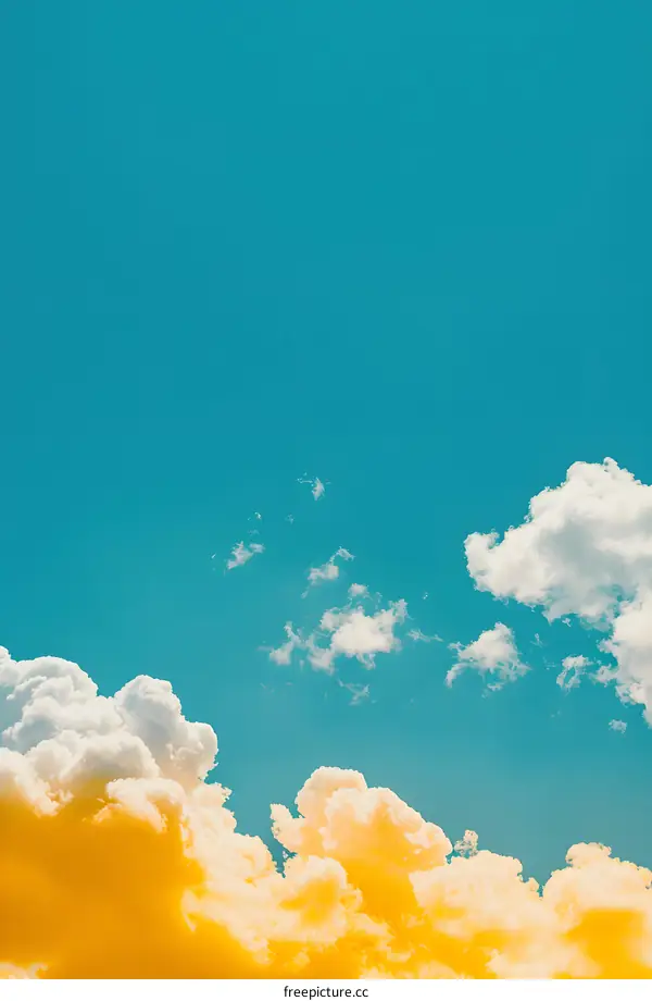 Blue Sky With Yellow and White Clouds