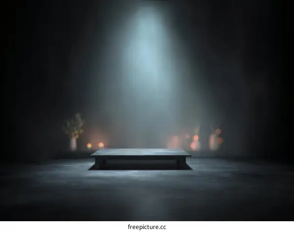 Empty Dark Studio Stage with Spotlight on Concrete Floor