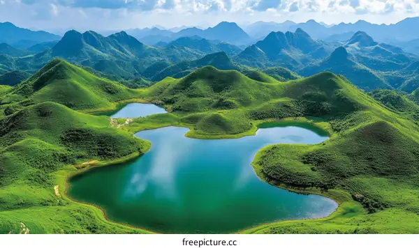 Majestic Mountain Lakescape with Lush Green Hills