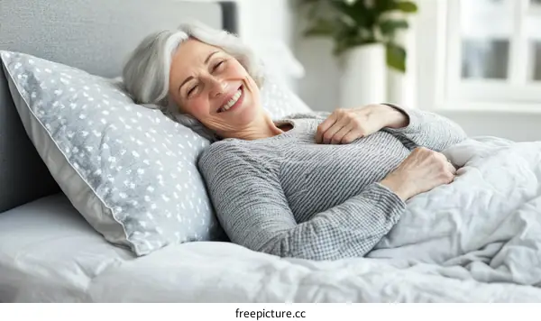 Senior Woman Relaxing in Bed