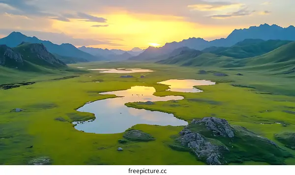 Majestic Mountain Valley at Sunset with Serene Lakes