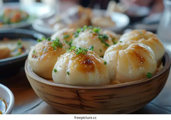 A bamboo steamer full of delicious steamed buns