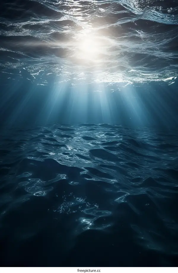 Underwater Ocean Scene with Sunlight Shining Through the Water Surface