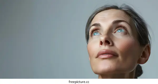 Close up portrait of a beautiful woman looking up