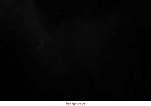 Abstract Black Background with Light Particles
