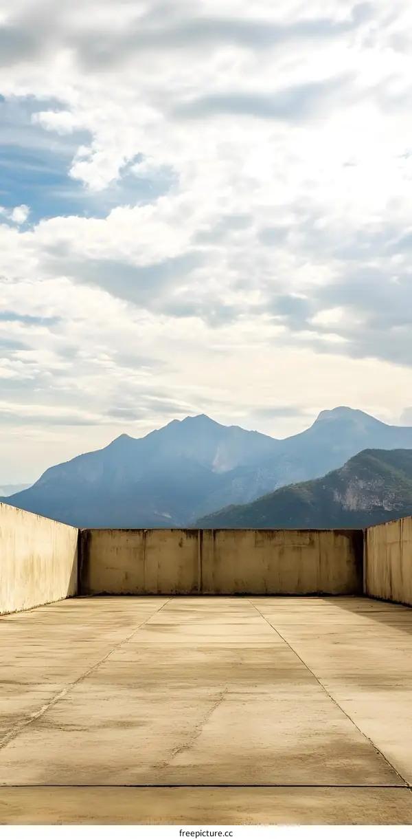 Empty Concrete Rooftop With Mountain View