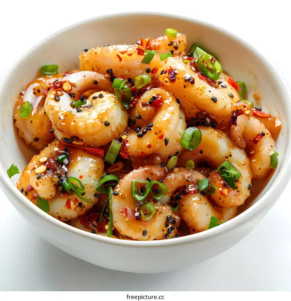 bowl of food with shrimp, peppers, and green onions