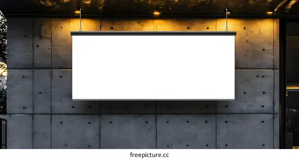 Blank White Sign Hanging on Concrete Wall