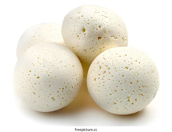 Four white balls with holes