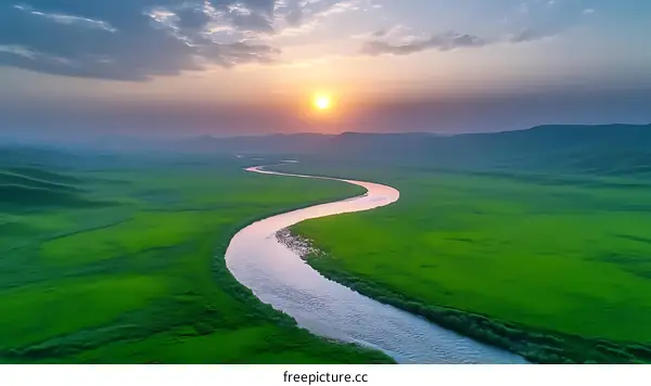 Sunrise over a Winding River in a Lush Meadow