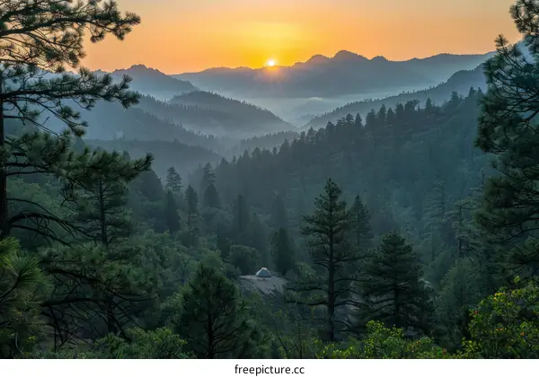 Camping in the mountains under the sunrise