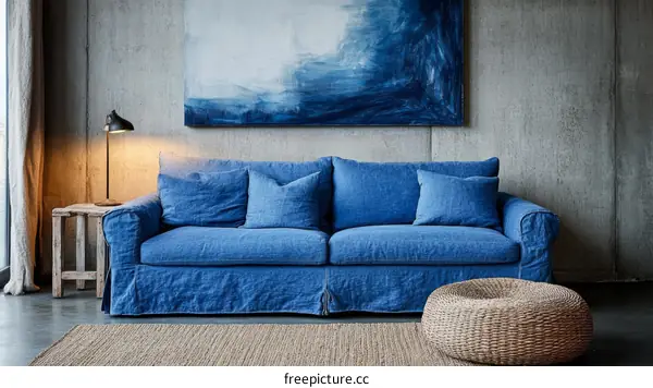 Modern Living Room with Blue Sofa and Abstract Art