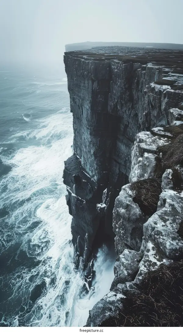 Dramatic Cliff Face Rising from the Ocean
