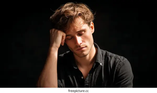 Close-up Portrait of a Caucasian Man Looking Downward