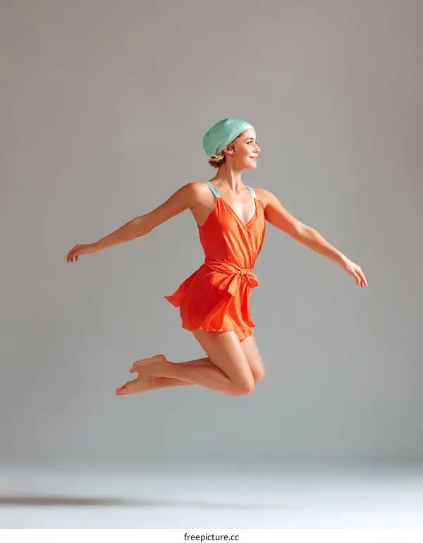 A Woman in an Orange Dress Jumping