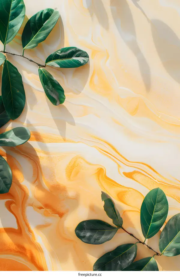 Green Leaves on a Yellow and White Marble Background