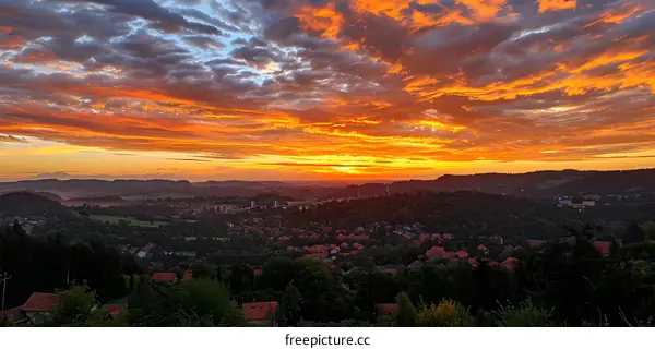 Fiery Sunset over a Small Town