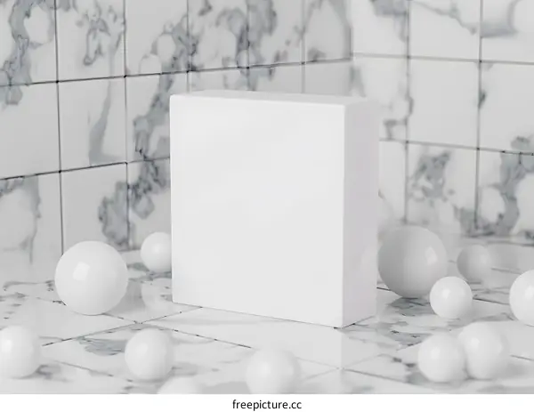 White Cube Mockup on Marble Background with White Spheres