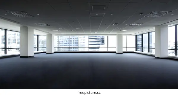 Empty Modern Office Space With Large Windows