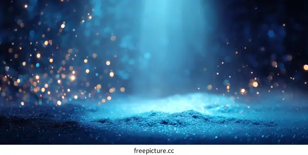 Abstract Blue Background with Sparkling Particles