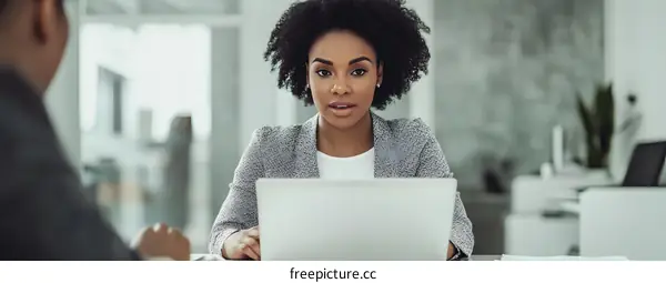 African American Businesswoman Working On Laptop