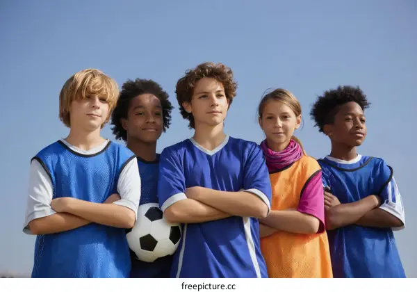 Youth Soccer Team Posing Outdoors