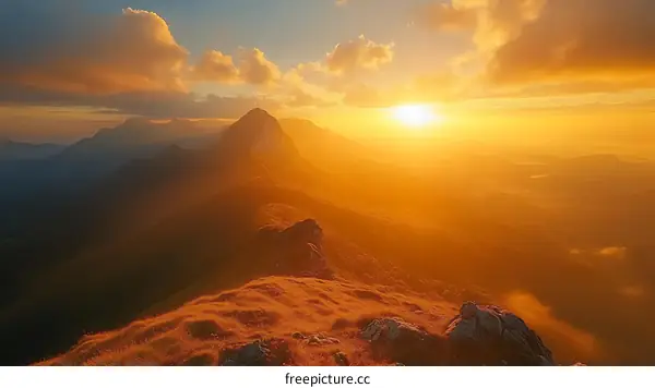 Golden Sunset Over Mountain Peaks