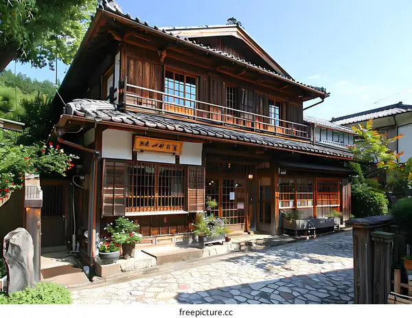 Traditional Japanese Wooden House with Stone Pathway