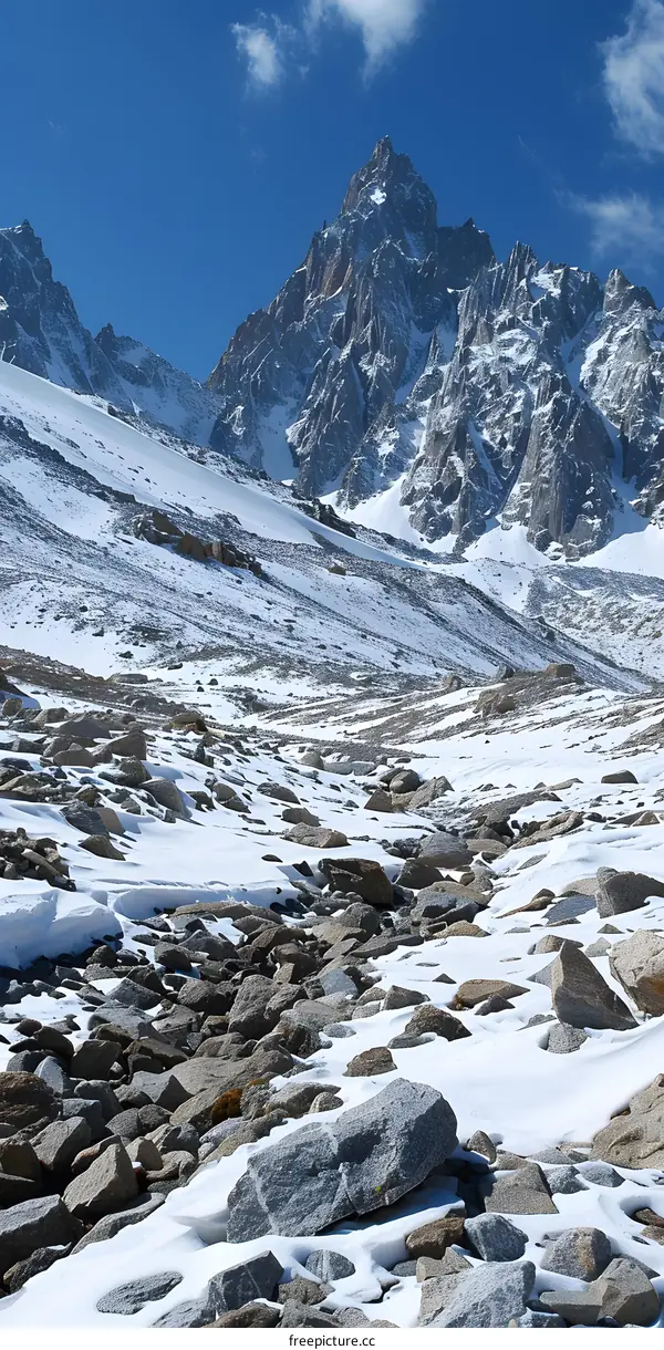 Snowy Mountain Range Landscape with Rocky Terrain