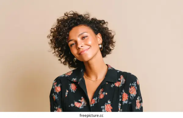 Portrait of a Beautiful Woman with Curly Hair