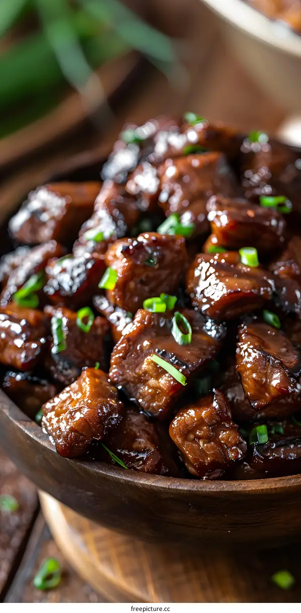 Beef stew in wooden bowl