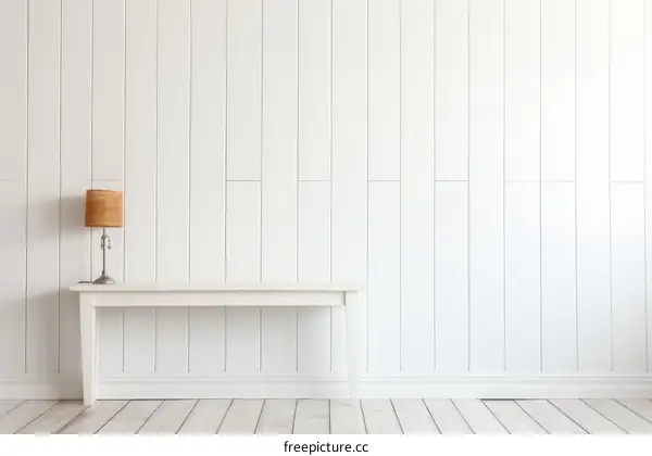 Minimalist White Room Interior with Wooden Table and Lamp