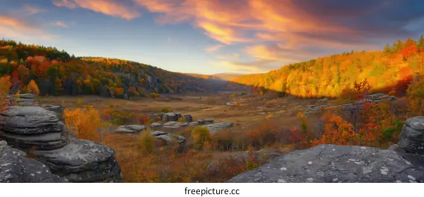 Autumnal Mountain Valley Landscape at Sunrise