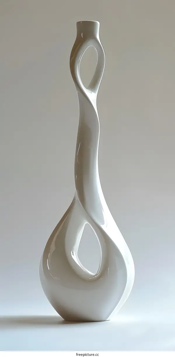 A photo of a studio pottery vase against a white background