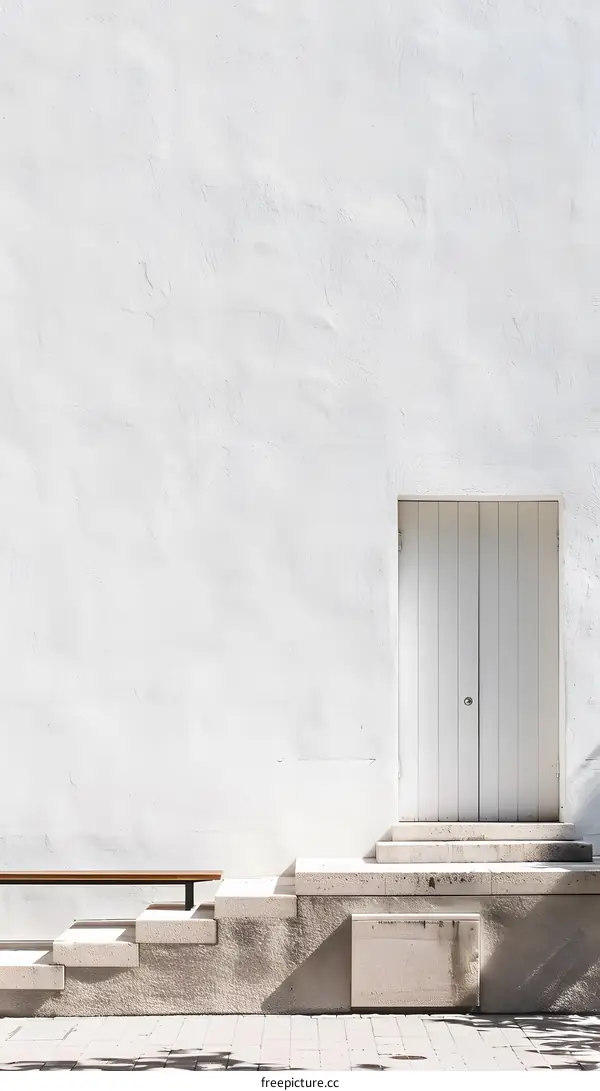 White Wall with a White Door and Stairs