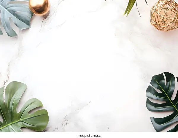 White Marble Background with Green Tropical Leaves and Gold Orbs