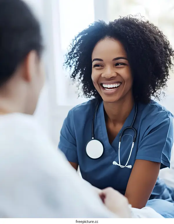 Smiling Black Female Doctor Talking With Patient
