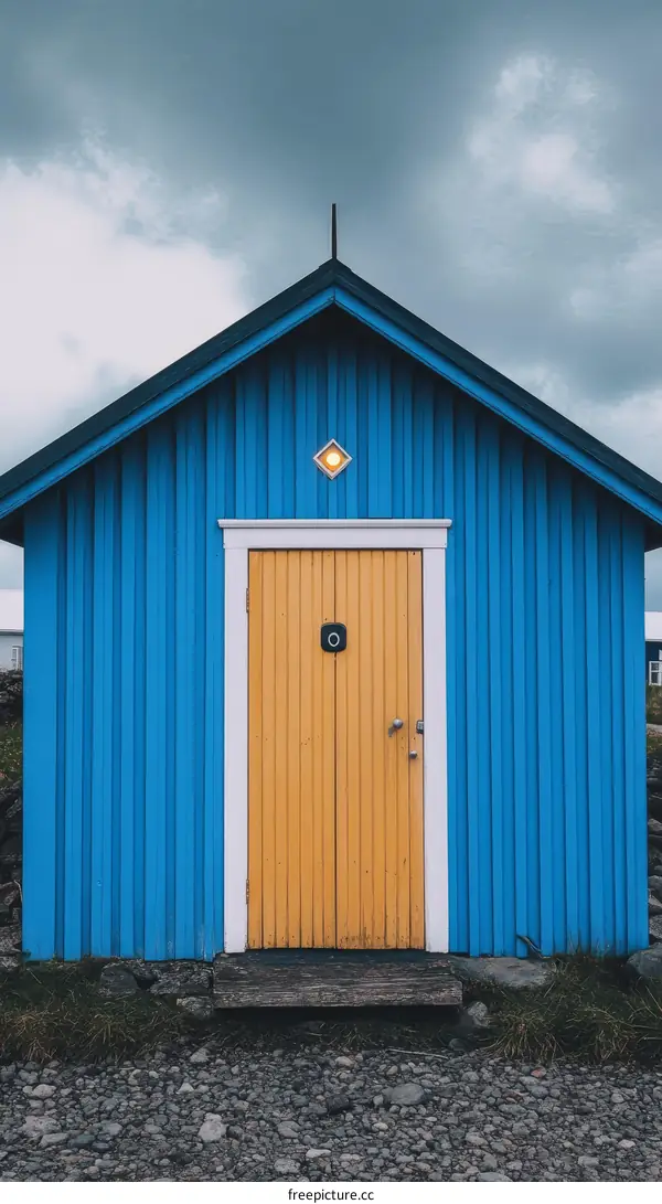 Coastal Blue Cabin with Yellow Door