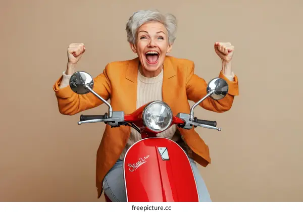 Excited Senior Woman Riding a Scooter