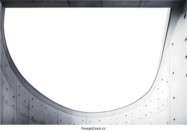 Concrete Wall with Curved Design and Sky