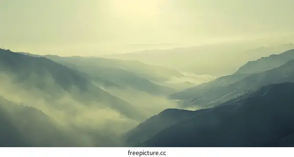 Misty Mountain Landscape at Sunrise