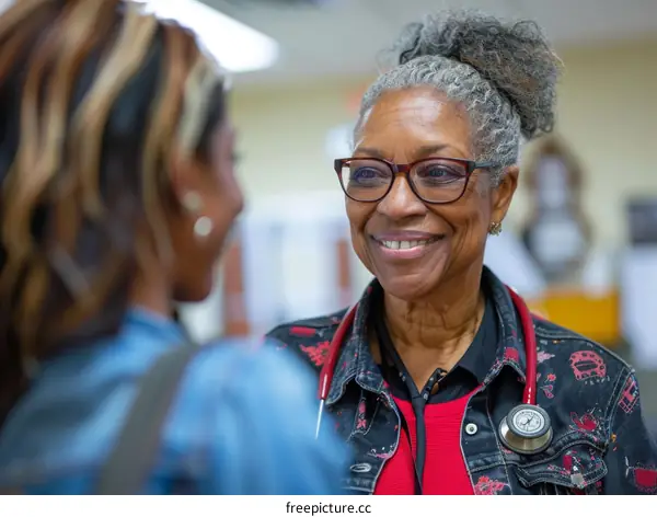 Smiling African American Female Doctor Talking to Patient