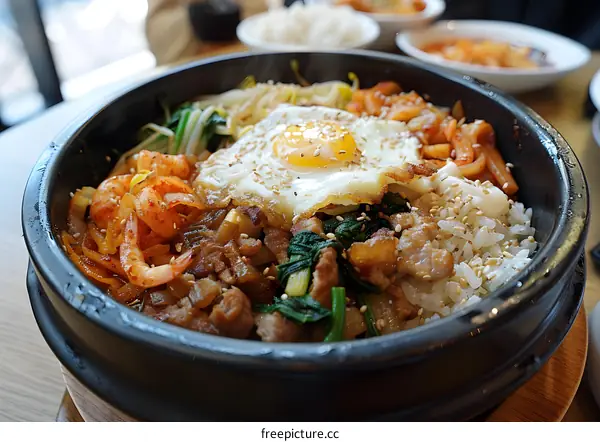 Korean Bibimbap with Fried Egg and Sesame Seeds