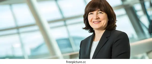 Smiling Businesswoman Portrait in Modern Office