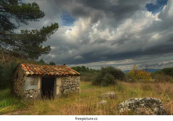 Stone House with a View and Cloudy Sky