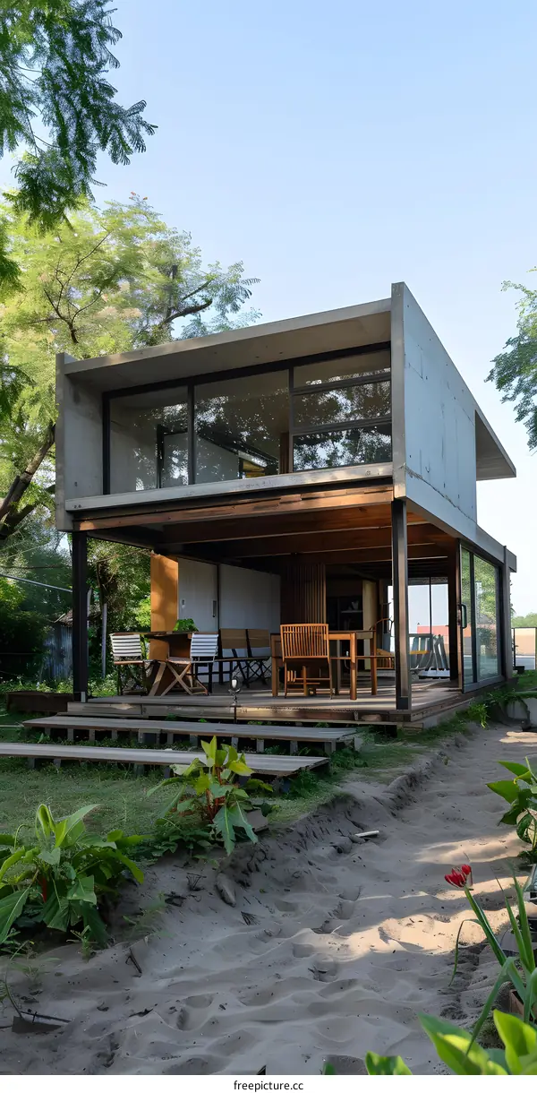 Modern Concrete House With Wooden Beams and Large Windows